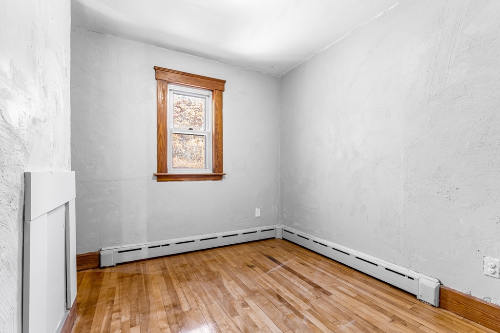 105 Conant Street Gardner, MA 01440 - Photo 5 of 19 a view of a room with wooden floor and pool table