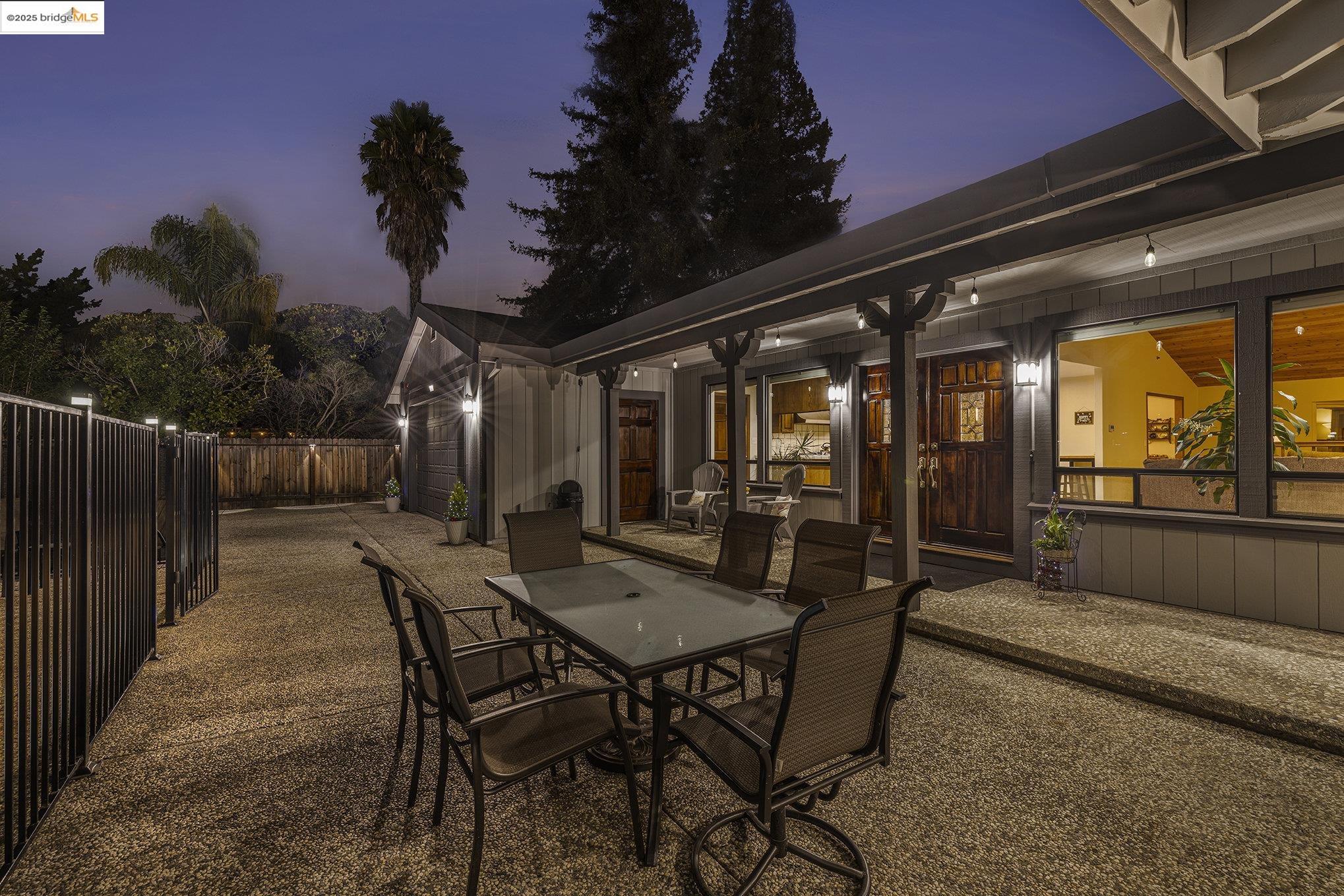 3622 Delancey Lane Concord, CA 94519 - Photo 10 of 32 a view of a patio with table and chairs with wooden floor and fence