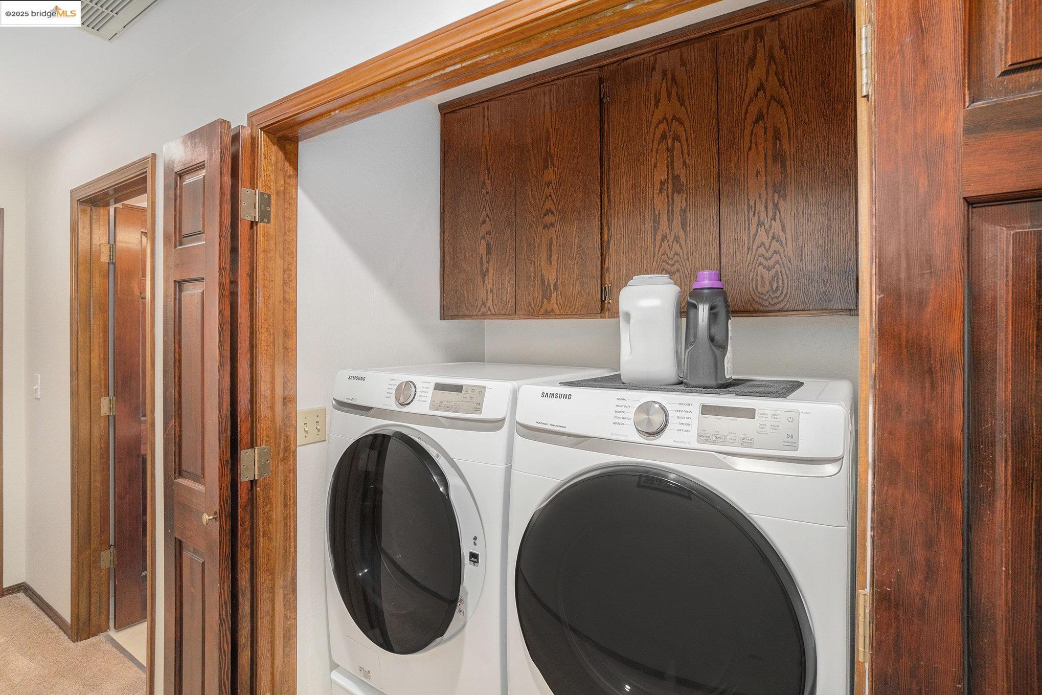 3622 Delancey Lane Concord, CA 94519 - Photo 26 of 32 Washroom with washer and clothes dryer and cabinet space