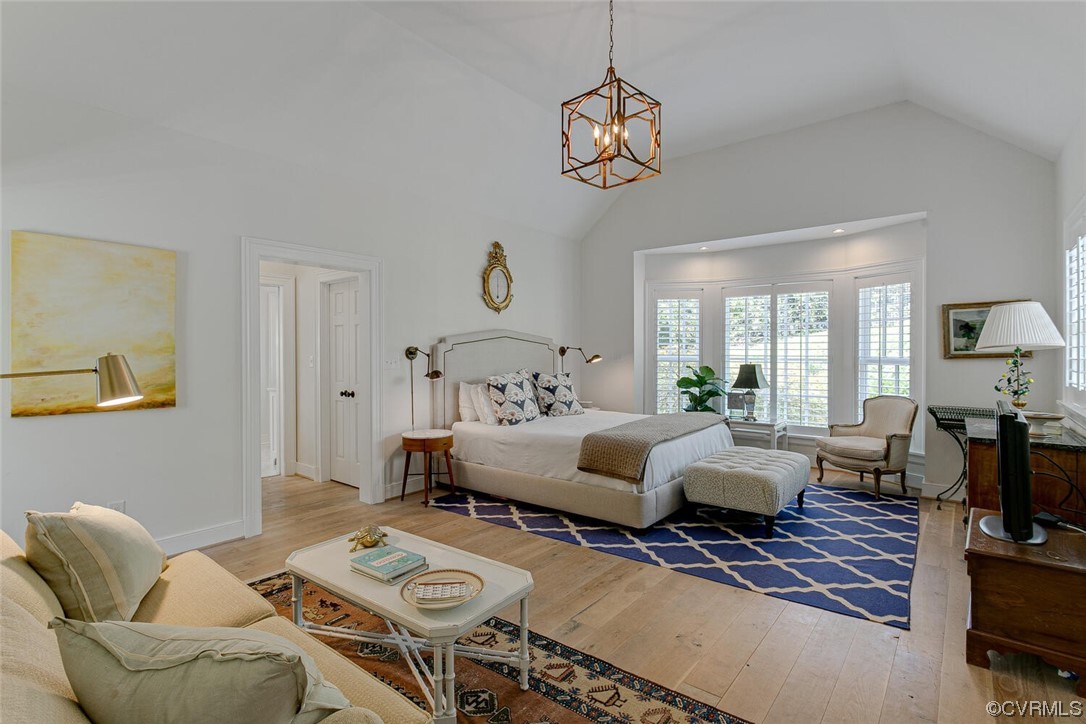 4 South Wilton Road Richmond, VA 23226 - Photo 17 of 49 a bed room with furniture and a chandelier