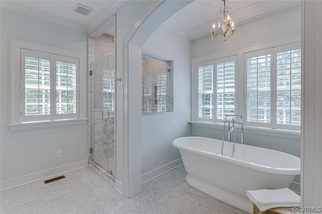 4 South Wilton Road Richmond, VA 23226 - Photo 21 of 49 a white bath tub sitting in a spacious bathroom next to a window