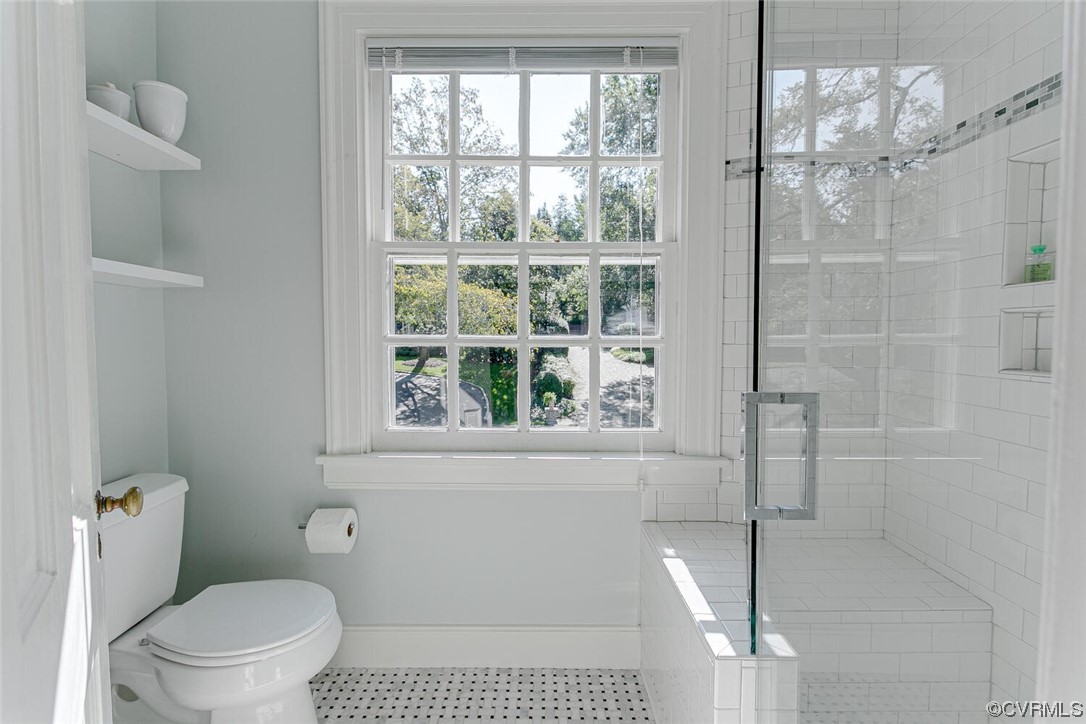 4 South Wilton Road Richmond, VA 23226 - Photo 30 of 49 a bathroom with a toilet a window and a shower