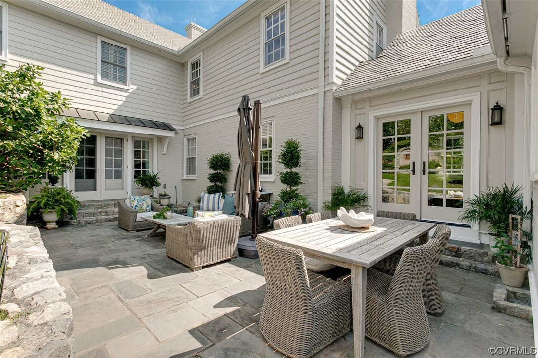 4 South Wilton Road Richmond, VA 23226 - Photo 35 of 49 a backyard of a house with barbeque oven table and chairs