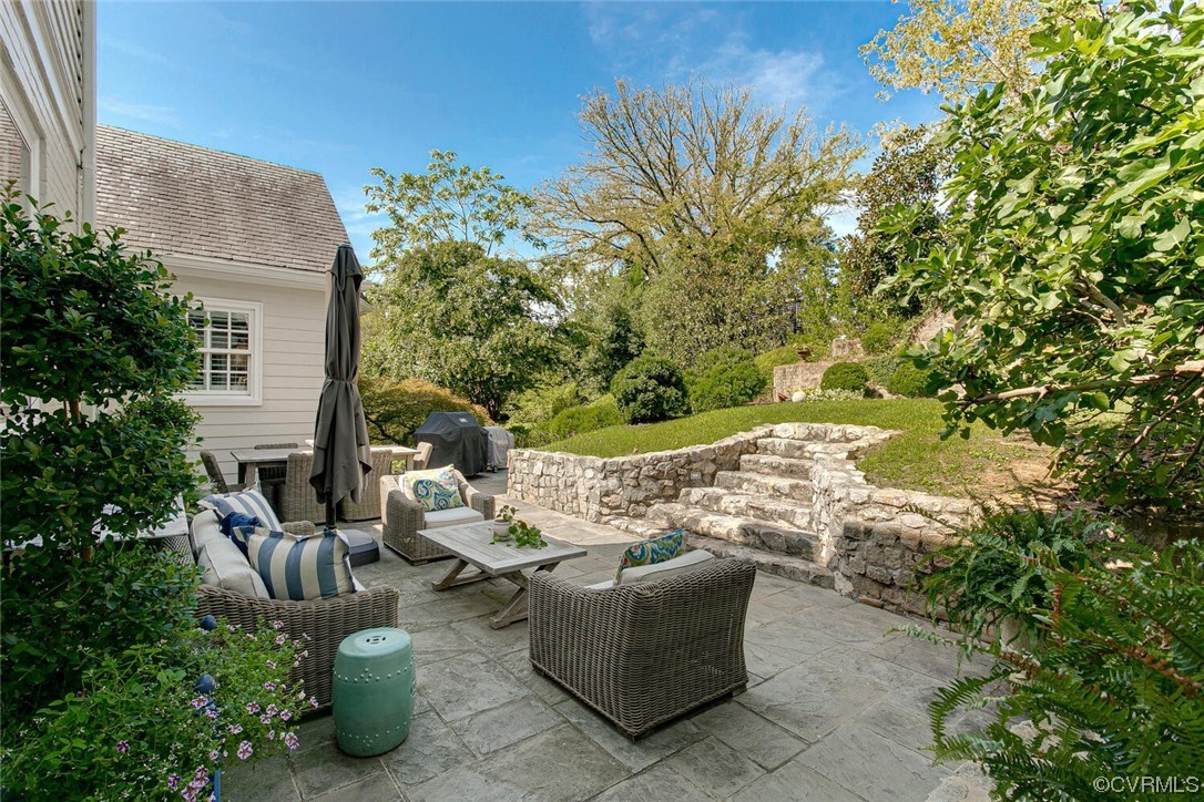 4 South Wilton Road Richmond, VA 23226 - Photo 36 of 49 a view of a patio with table and chairs and potted plants