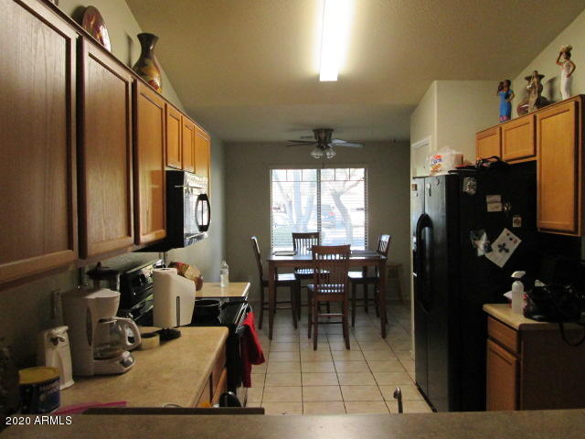 8531 West Payson Road Tolleson, AZ 85353 - Photo 5 of 17 kitchen/dining