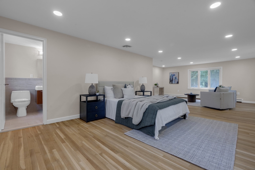 15 Marcellus Drive Newton, MA 02459 - Photo 12 of 27 a bed room with a bed and a mirror