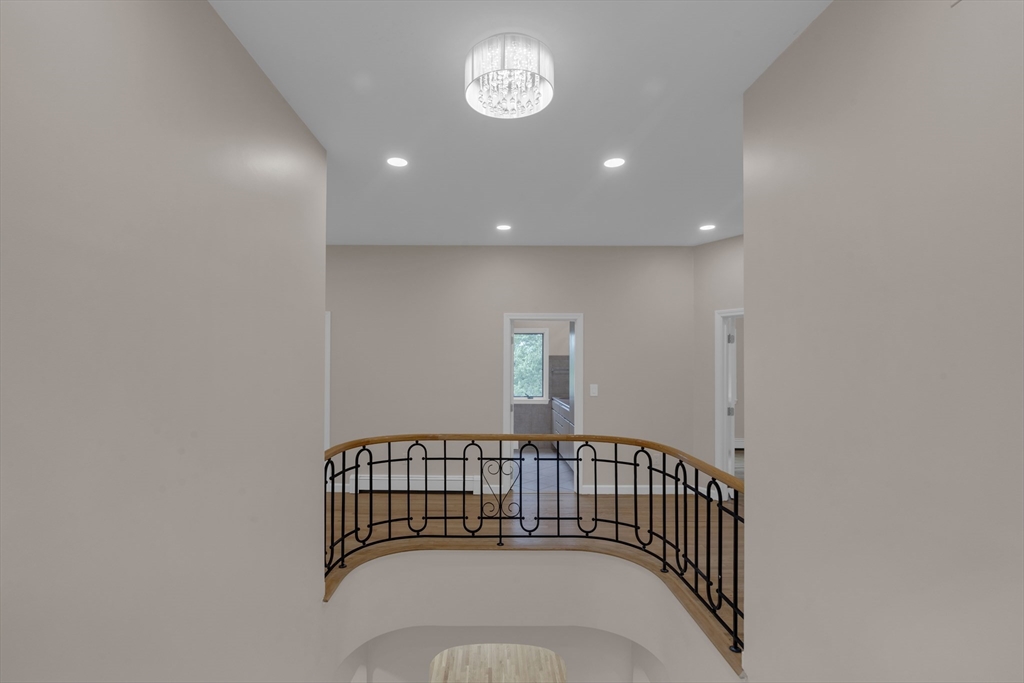 15 Marcellus Drive Newton, MA 02459 - Photo 13 of 27 a view of a hallway with windows