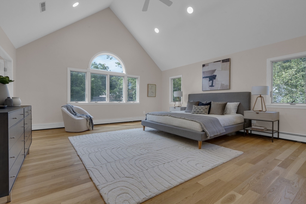 15 Marcellus Drive Newton, MA 02459 - Photo 14 of 27 a bedroom with furniture and a large window