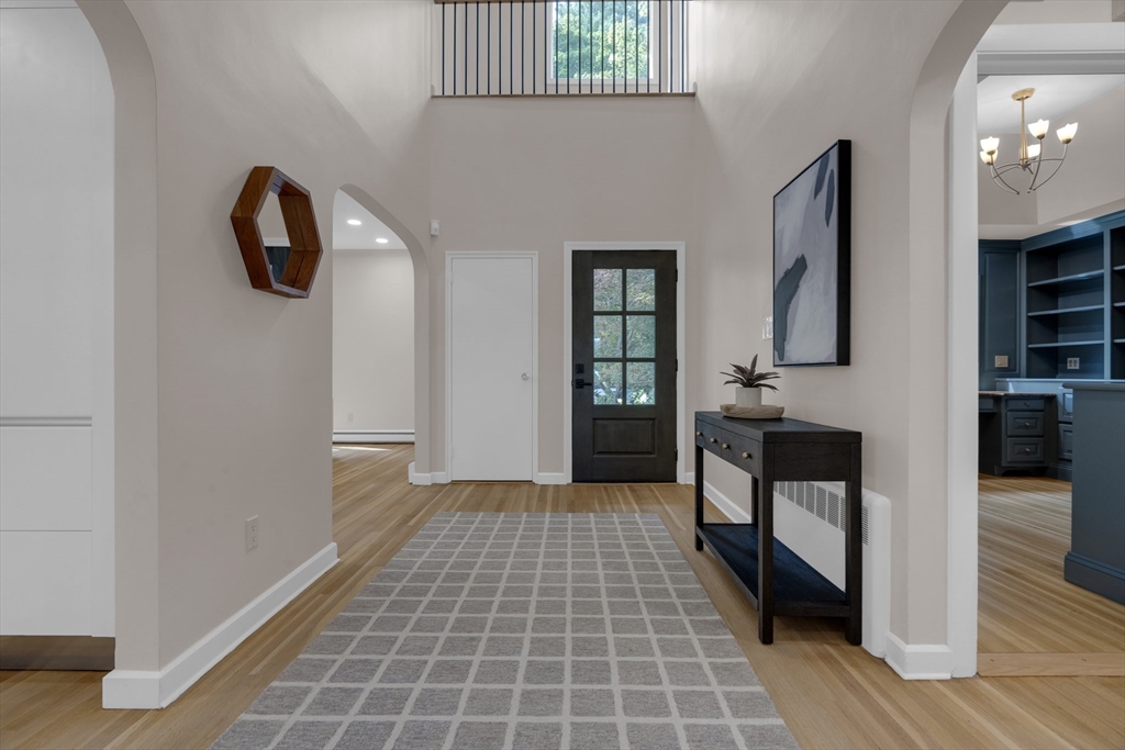 15 Marcellus Drive Newton, MA 02459 - Photo 7 of 27 a view of entryway with livingroom and furniture