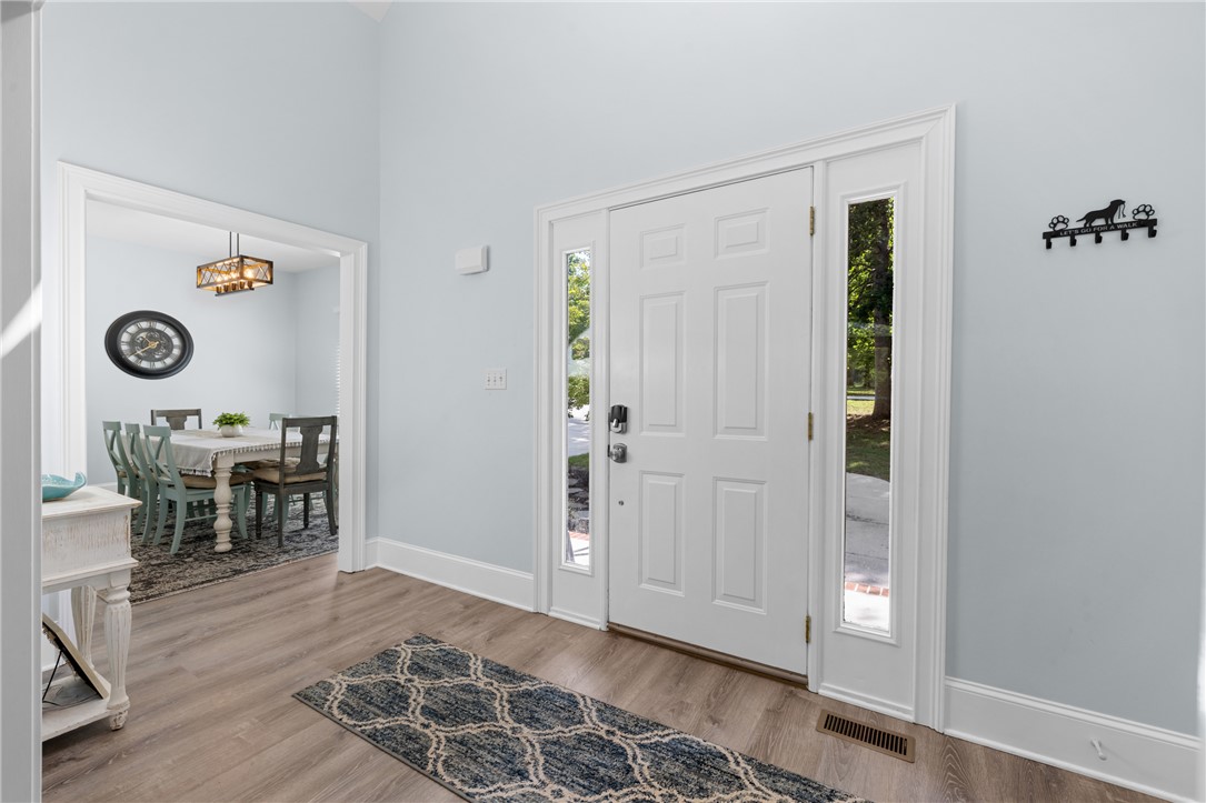 206 Petty Road Seneca, SC 29672 - Photo 5 of 47 A welcoming entry opens to a charming dining area, perfect for entertaining.