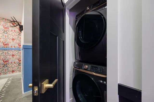 a bathroom with a sink toilet and mirror