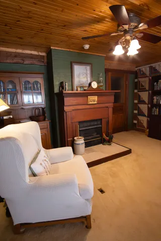 a bathroom with a sink a bathtub a mirror and a window