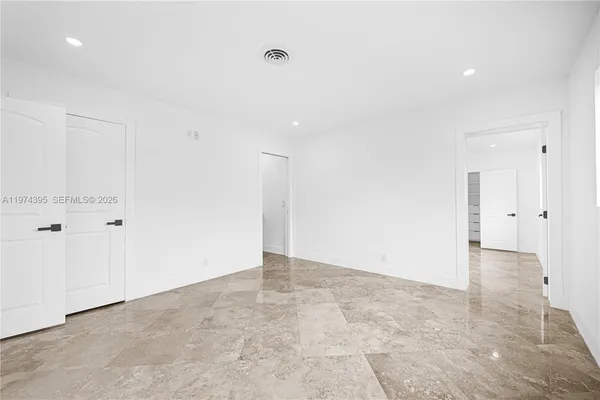 an empty room with windows