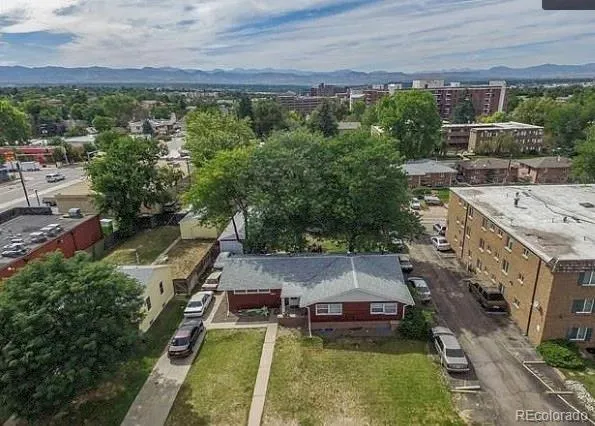 an aerial view of a house with a garden