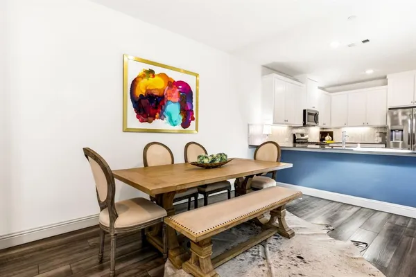 a table and chairs in a kitchen