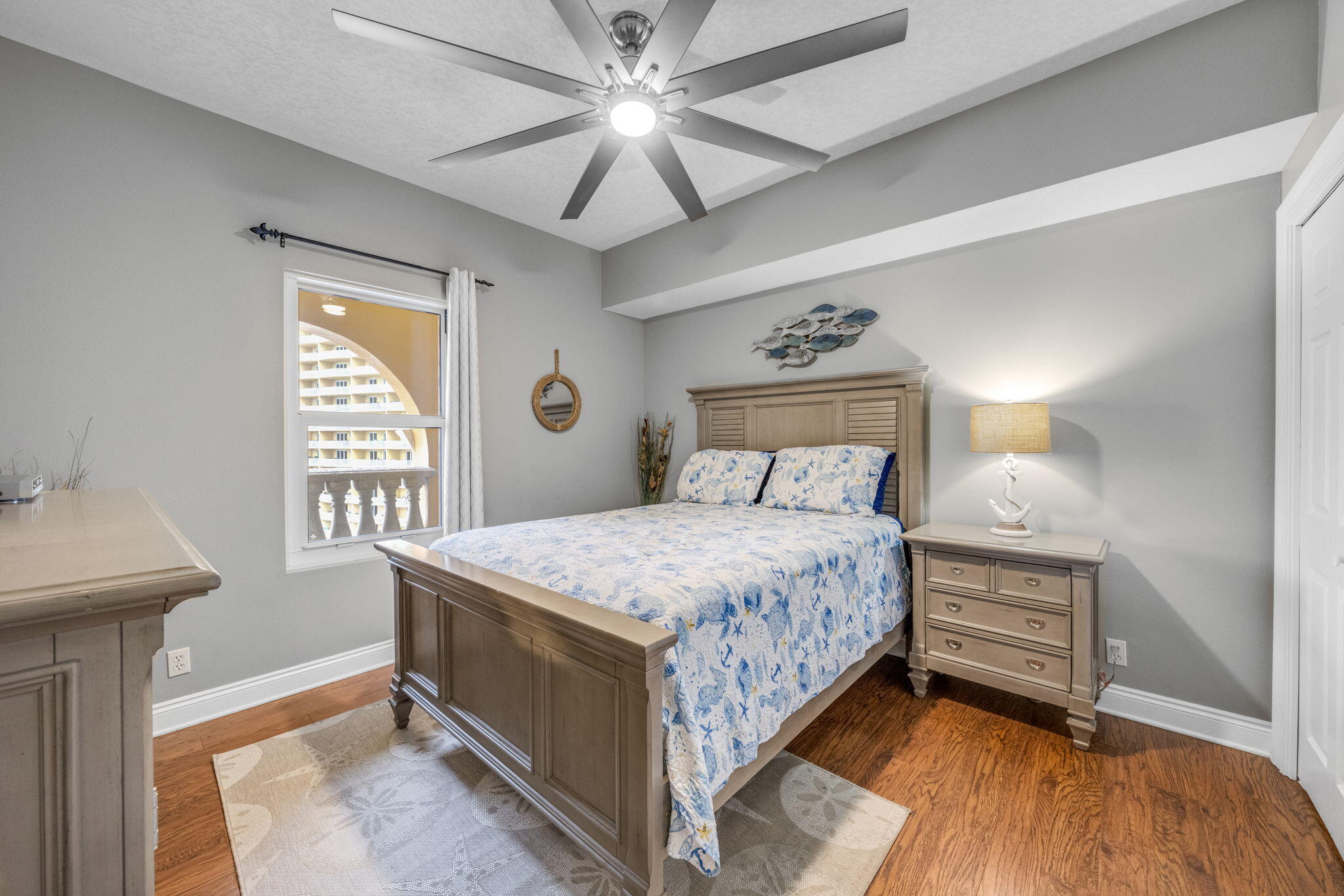 15817 Front Beach Road, Unit 21409 Panama City Beach, FL 32413 - Photo 11 of 23 a bedroom with a bed and a window