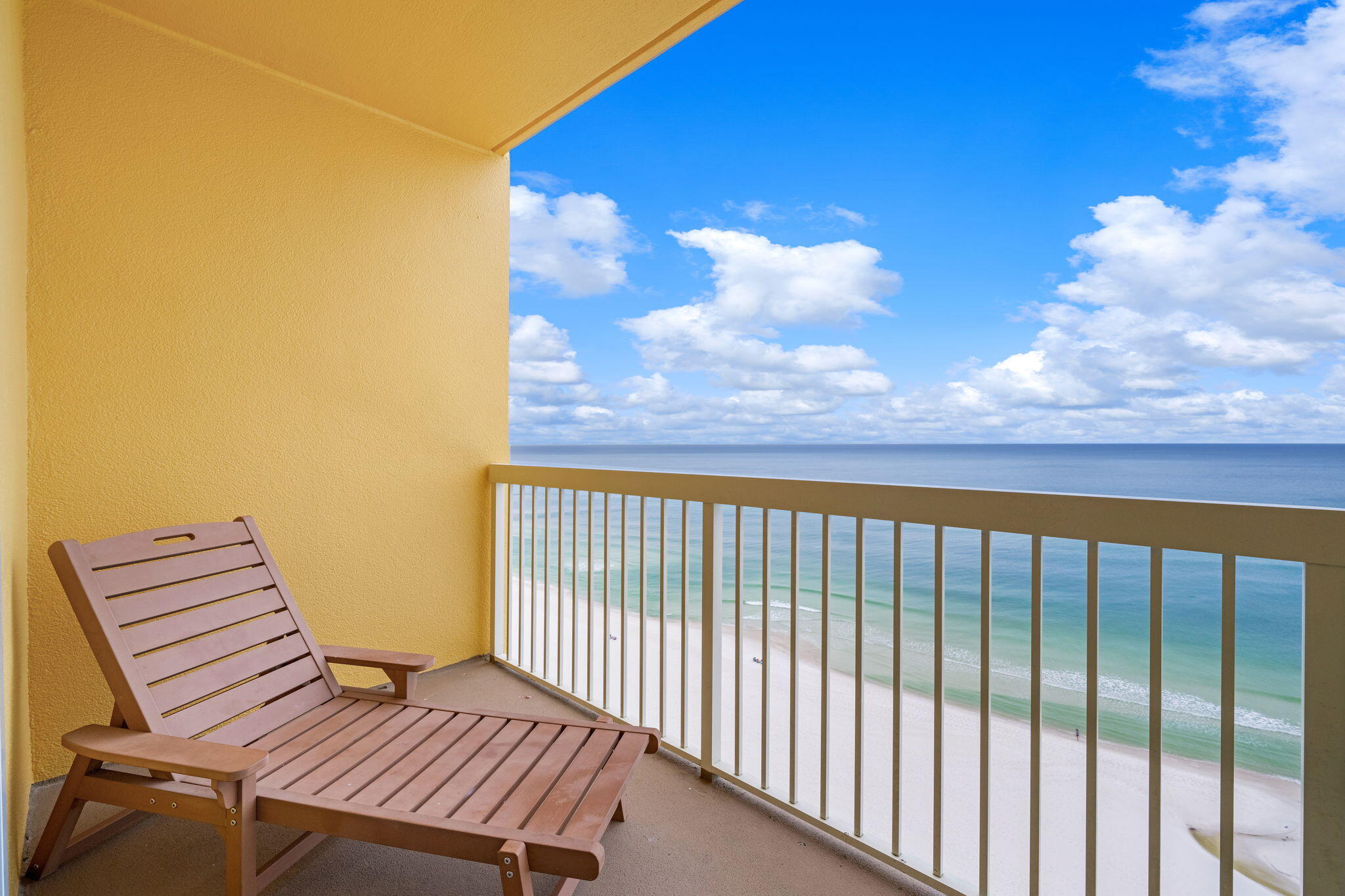 15817 Front Beach Road, Unit 21409 Panama City Beach, FL 32413 - Photo 16 of 23 a view of a balcony with wooden floor