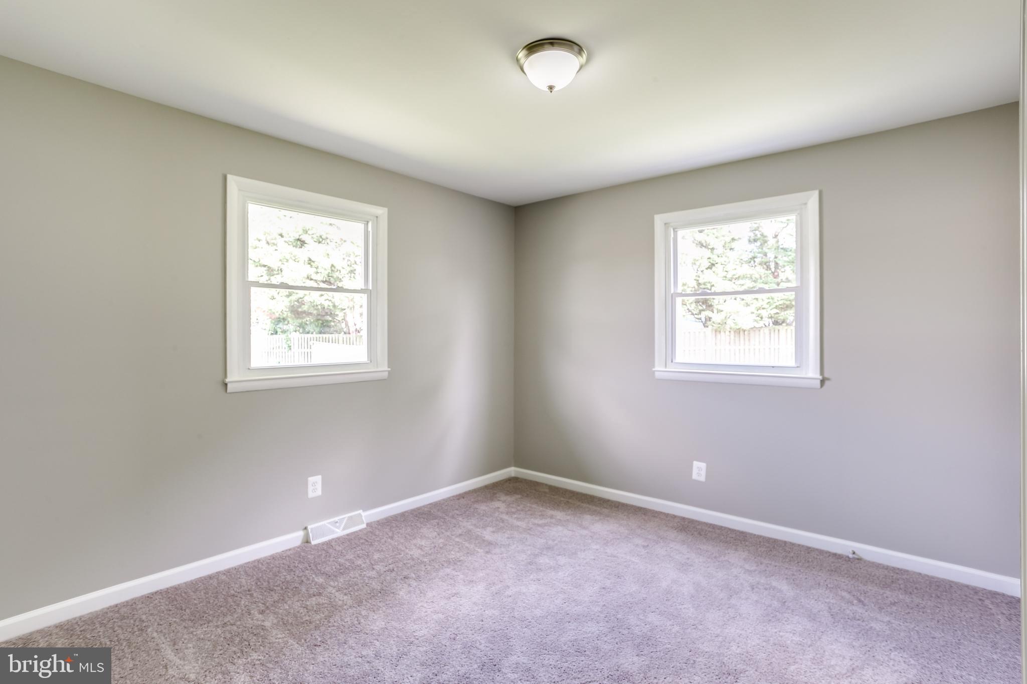 7106 Munford Road Baltimore, MD 21244 - Photo 19 of 31 an empty room with windows