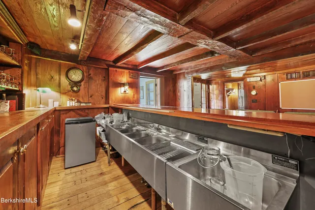 a kitchen with a table and chairs