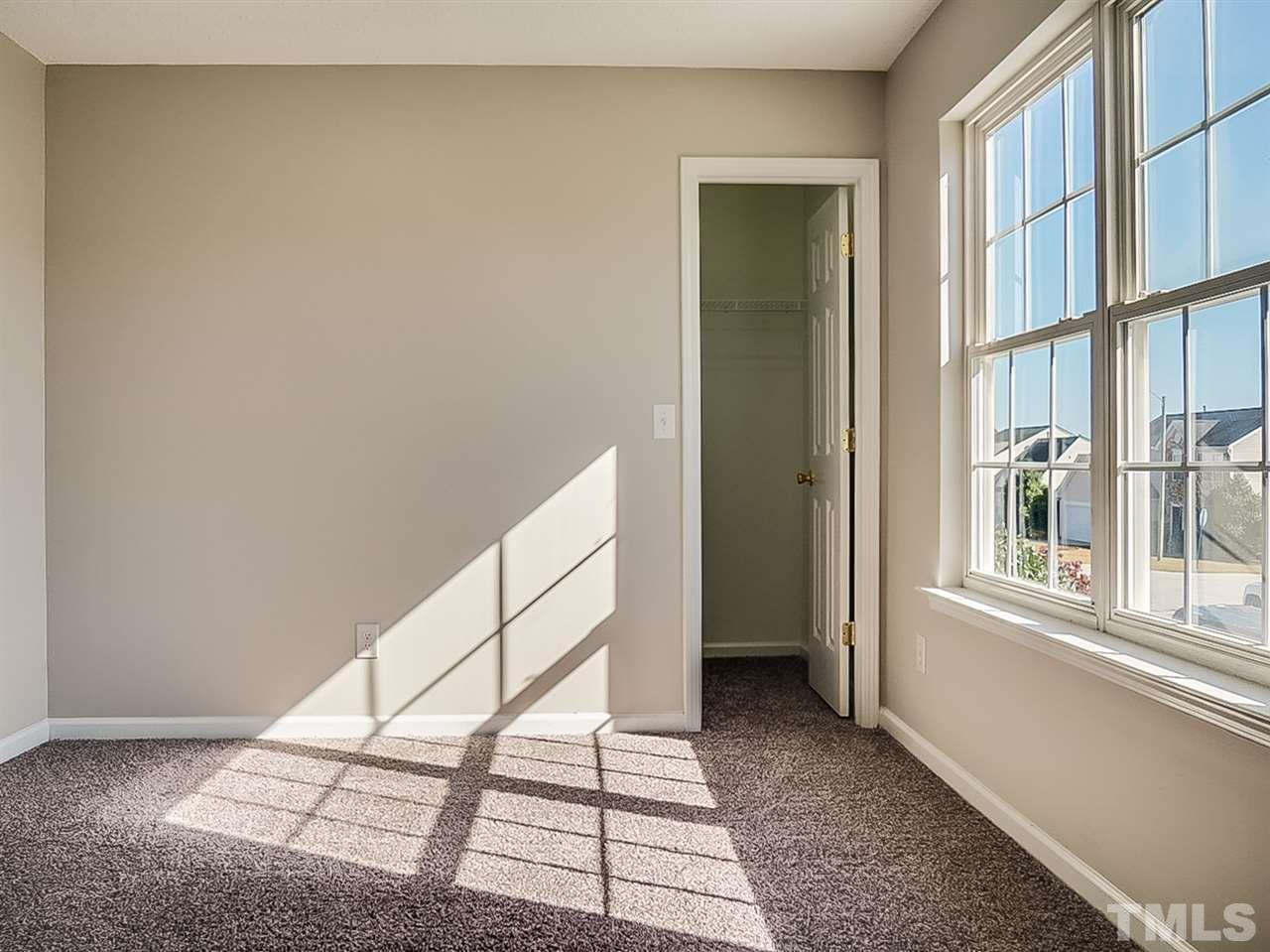 5705 Quitman Trail Raleigh, NC 27610 - Photo 15 of 20 a view of an entryway with staircase