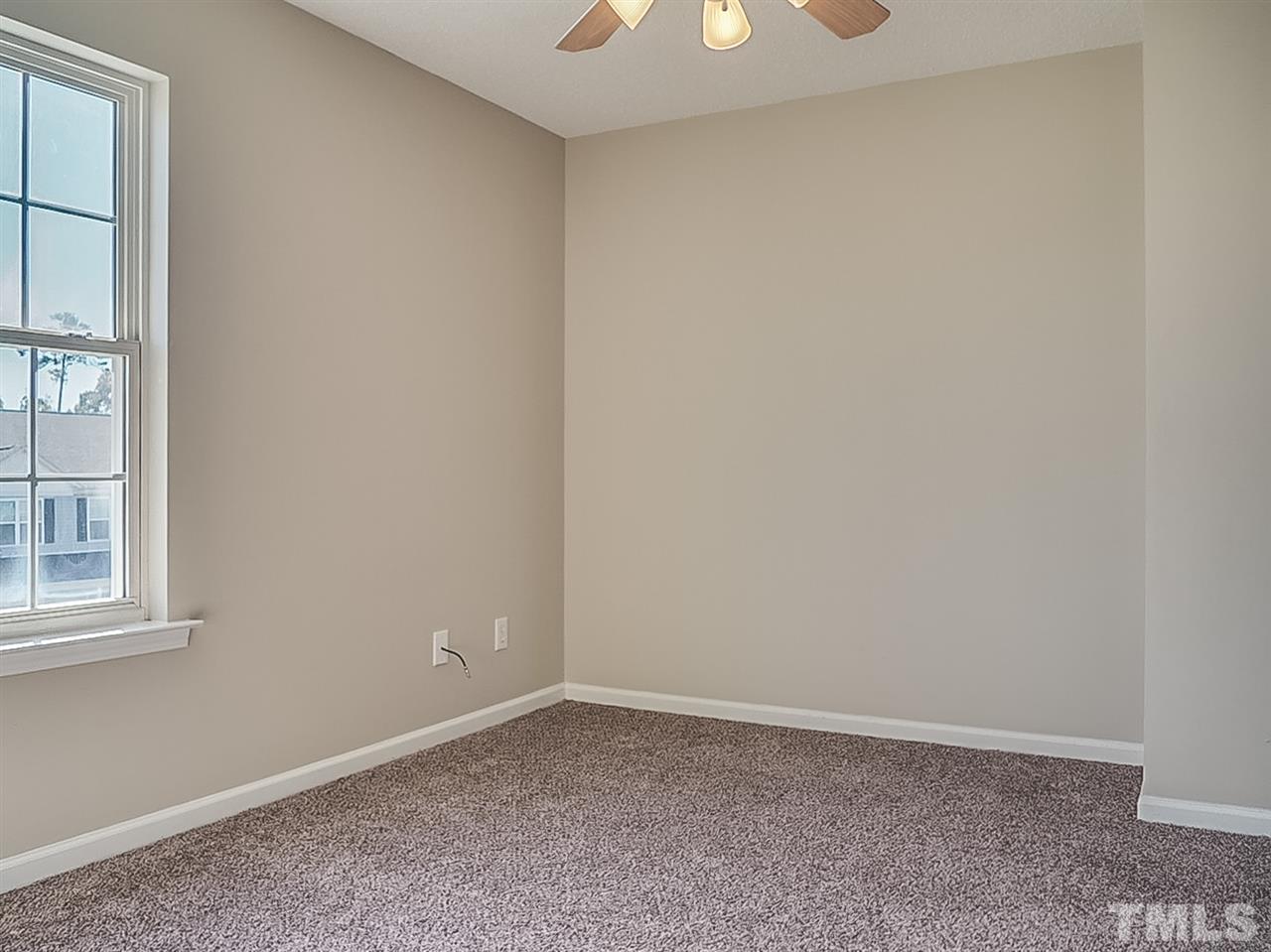 5705 Quitman Trail Raleigh, NC 27610 - Photo 16 of 20 an empty room with a window