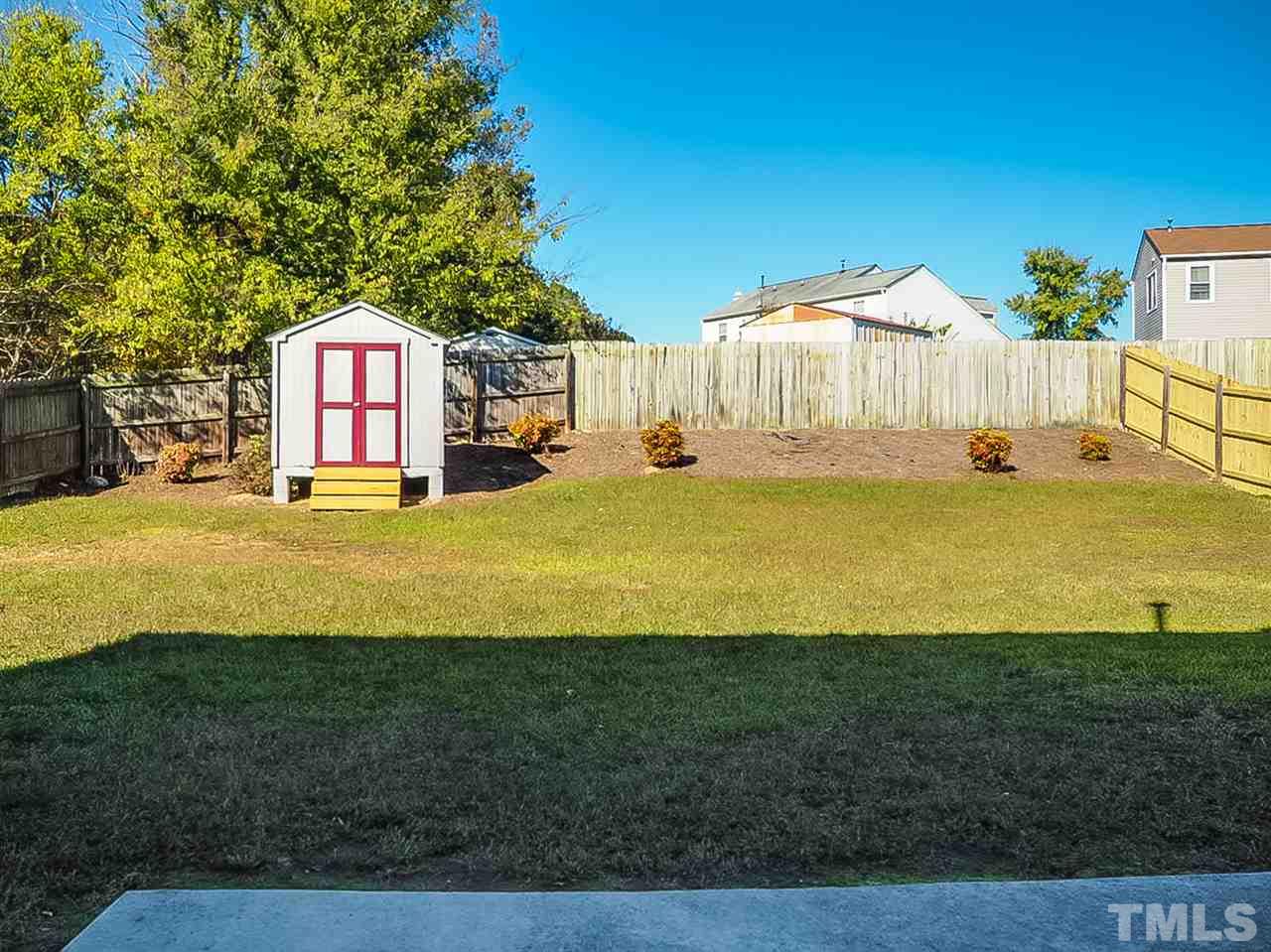 5705 Quitman Trail Raleigh, NC 27610 - Photo 19 of 20 a view of a house with a yard