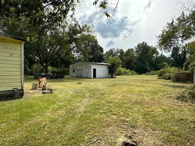 4769 West Union Road Millington, TN 38053 - Photo 3 of 6 View of yard featuring an outbuilding