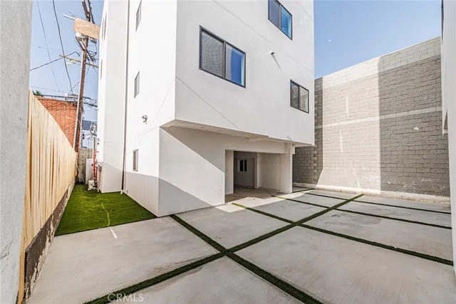 a view of house with yard