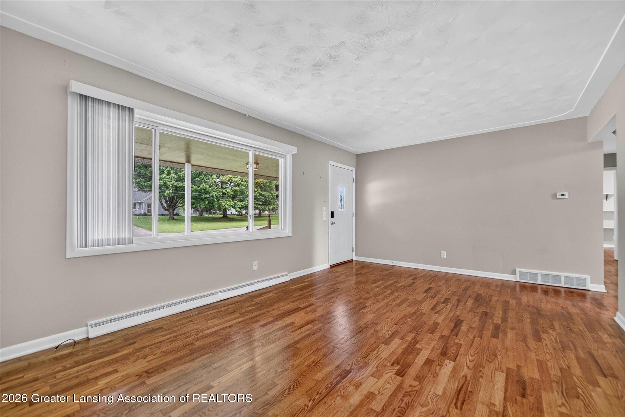 12916 Rambler Road Dewitt, MI 48820 - Photo 5 of 59 08-12916-Rambler-Rd-WindowStill-Photogra