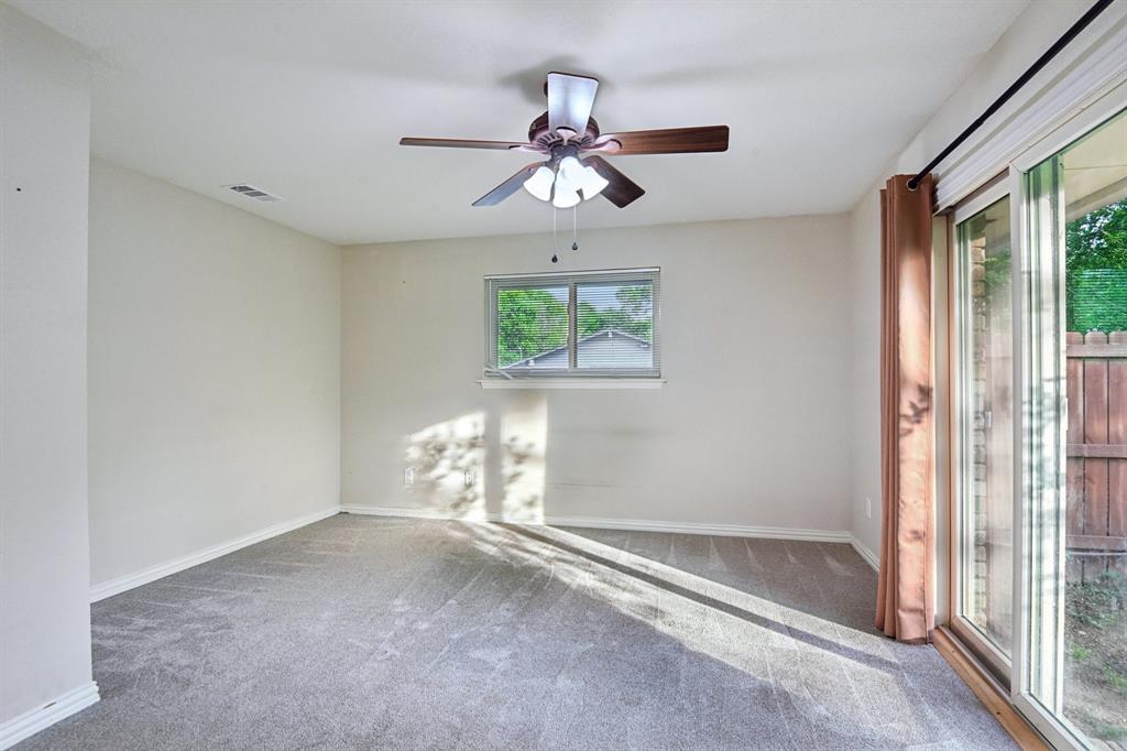 305 South Cockrell Hill Road Ovilla, TX 75154 - Photo 21 of 40 a view of an empty room with a window