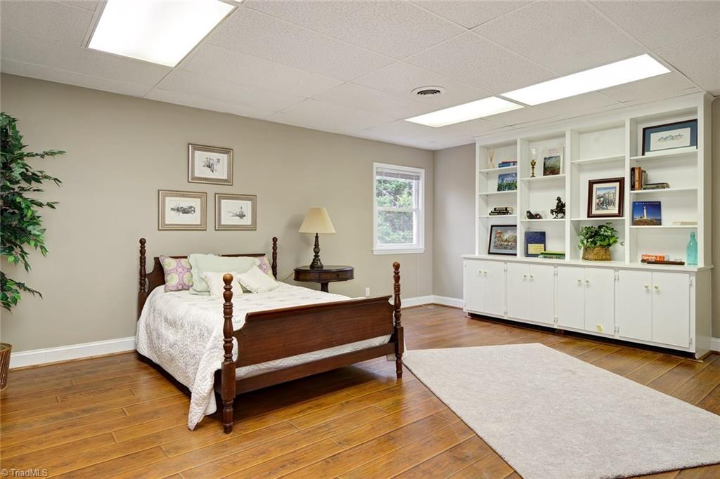 4912 Hackamore Road Greensboro, NC 27410 - Photo 22 of 30 Basement Bedroom with Built-ins (Nearly as large as the main level Master)