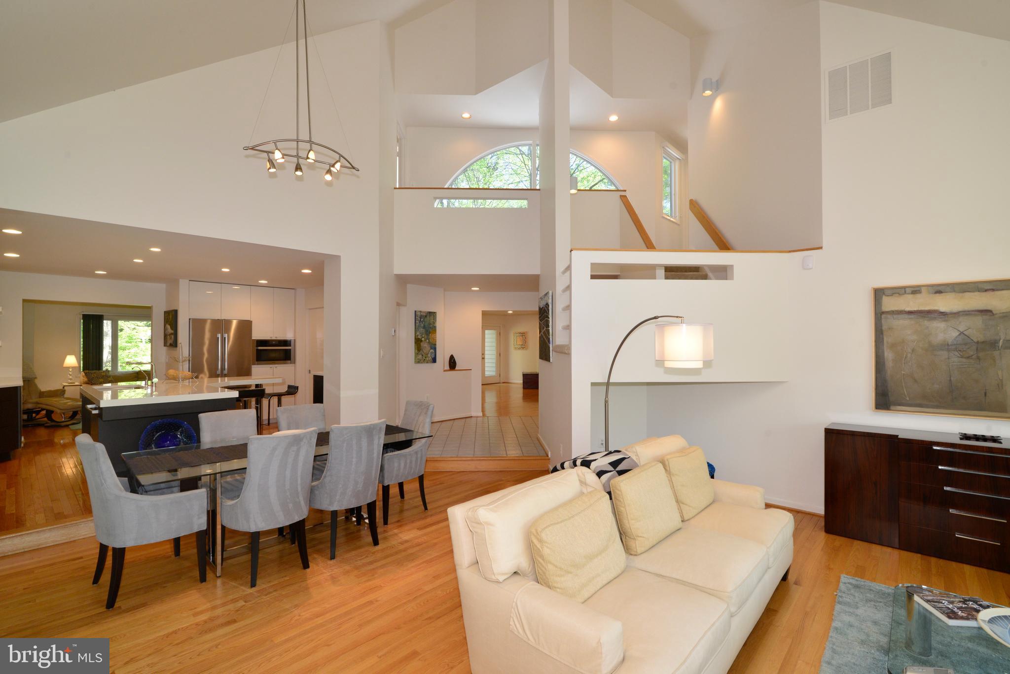 2262 Compass Point Lane Reston, VA 20191 - Photo 17 of 48 a living room with furniture and a flat screen tv