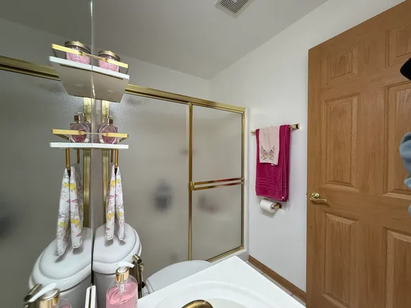 a utility room with sink dryer and washer