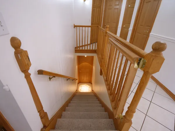 a view of an empty room with closet
