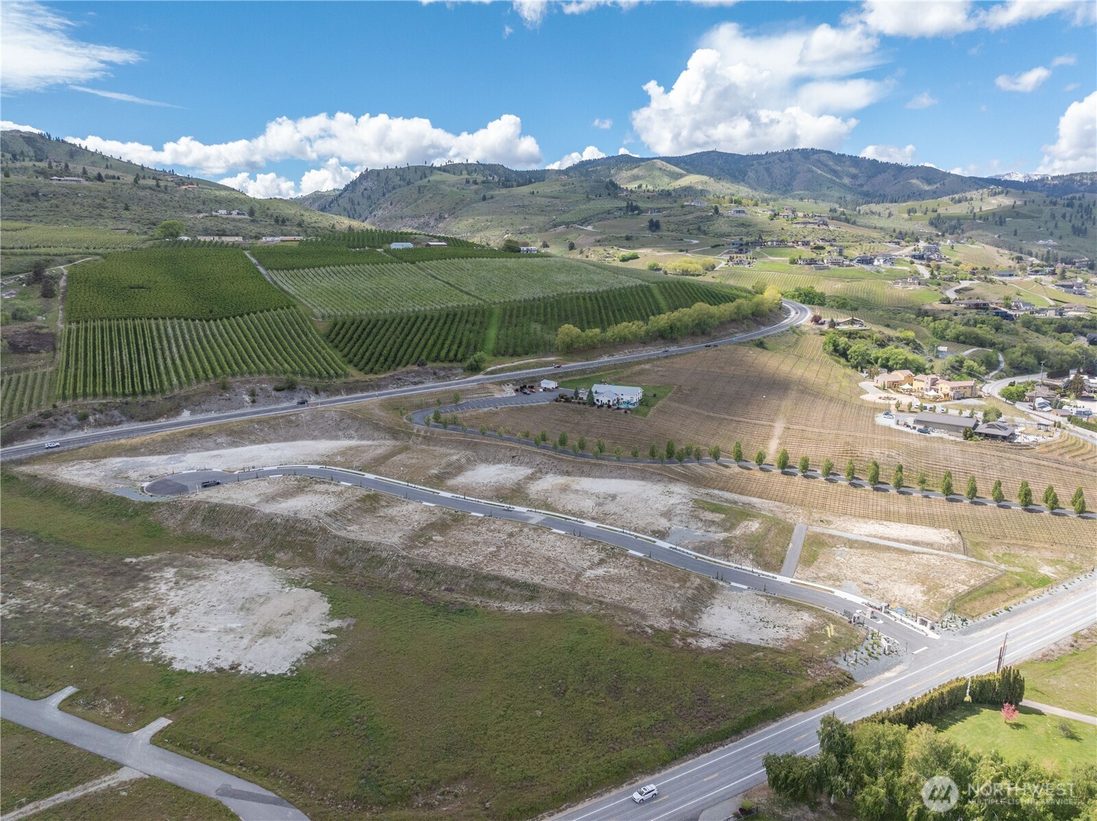 97 Loretta Lane Chelan, WA 98816 - Photo 12 of 30 a view of a town with mountains in the background