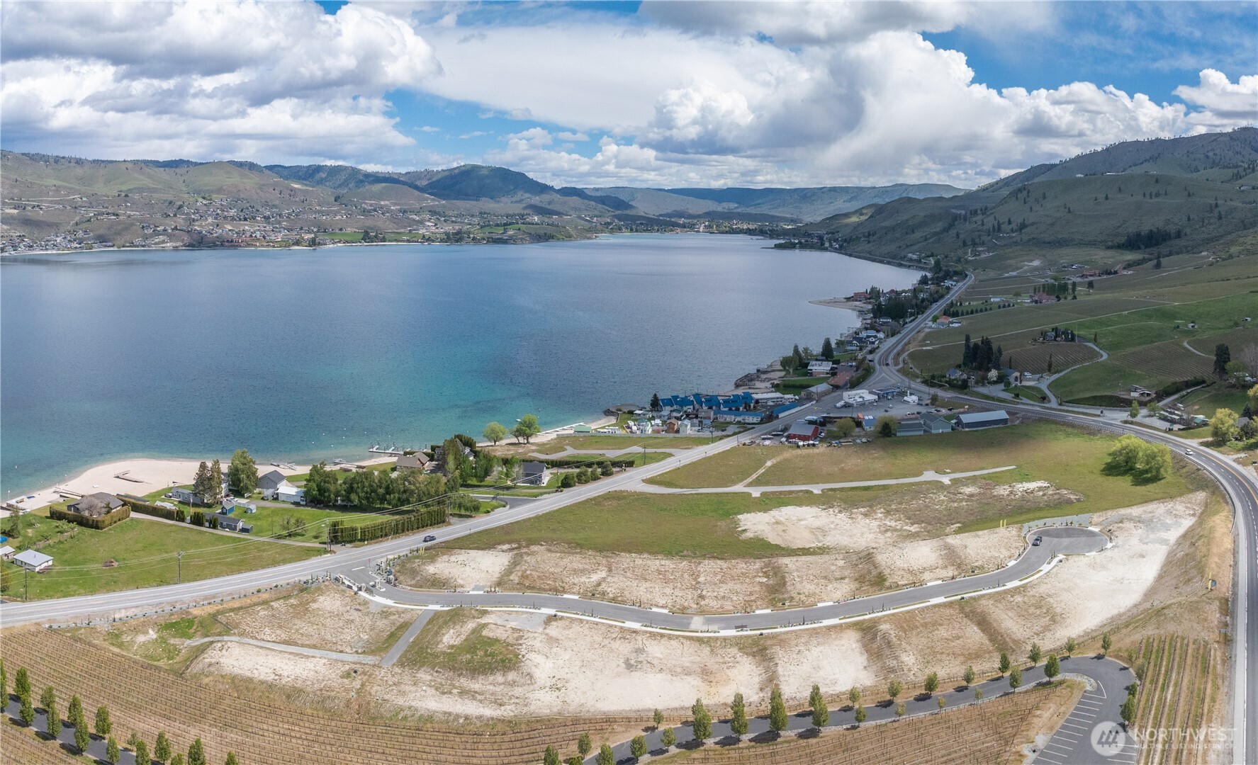 97 Loretta Lane Chelan, WA 98816 - Photo 16 of 30 a view of a swimming pool with a yard