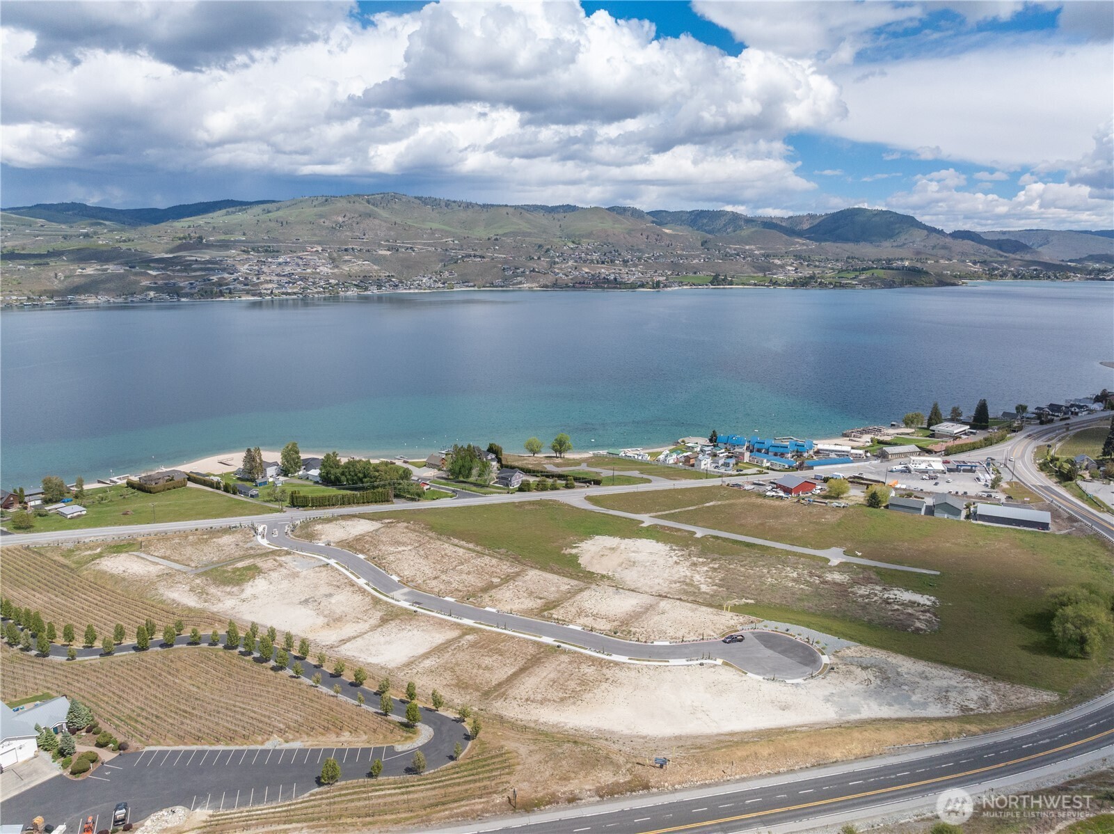 97 Loretta Lane Chelan, WA 98816 - Photo 17 of 30 a view of a lake with nearby beach