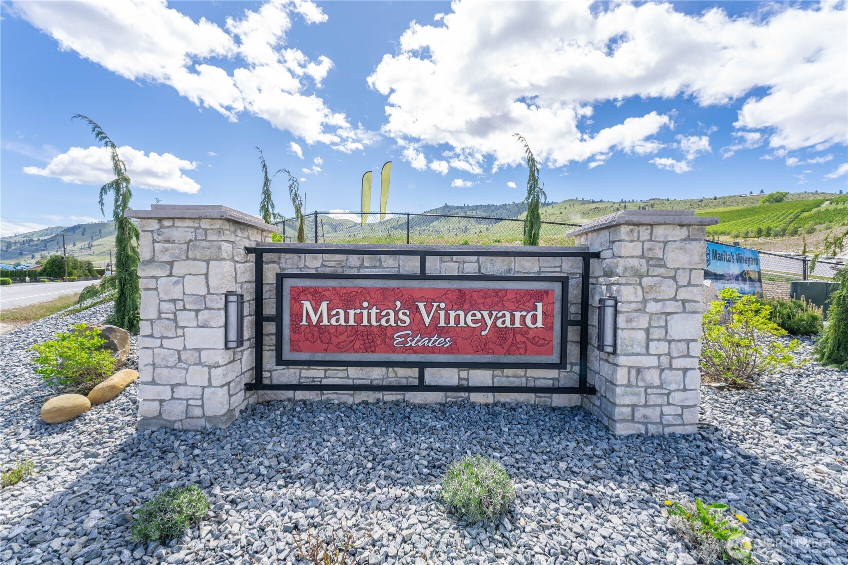 97 Loretta Lane Chelan, WA 98816 - Photo 2 of 30 a sign on the side of the road