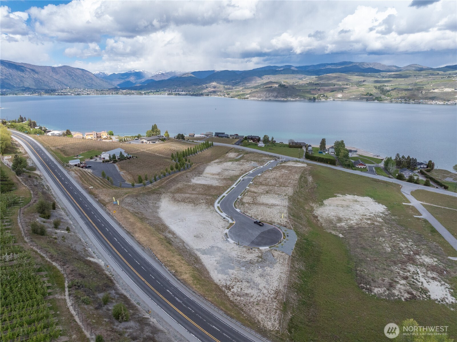 97 Loretta Lane Chelan, WA 98816 - Photo 5 of 30 a view of a lake with a mountain