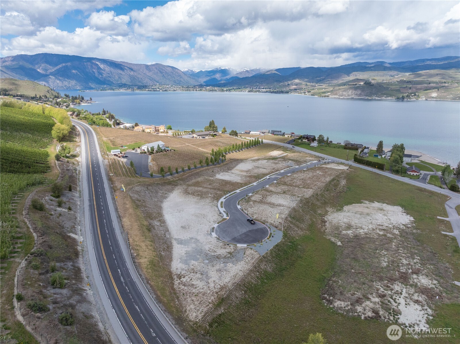 97 Loretta Lane Chelan, WA 98816 - Photo 6 of 30 a view of a lake in middle of the town