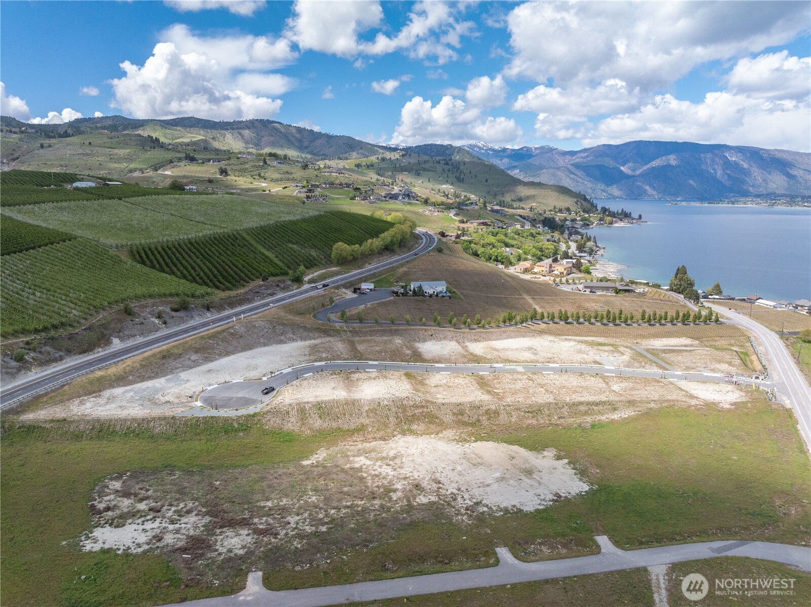 97 Loretta Lane Chelan, WA 98816 - Photo 9 of 30 a view of a lake from a yard