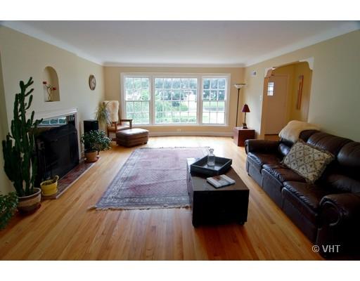 470 Uvedale Road Riverside, IL 60546 - Photo 2 of 12 a living room with furniture and a large window