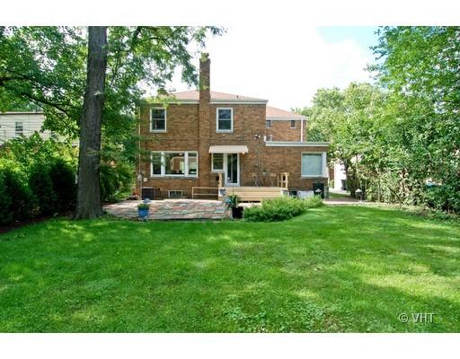 470 Uvedale Road Riverside, IL 60546 - Photo 11 of 12 a front view of a house with a yard