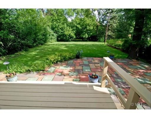 470 Uvedale Road Riverside, IL 60546 - Photo 12 of 12 a view of a patio with a table and chairs