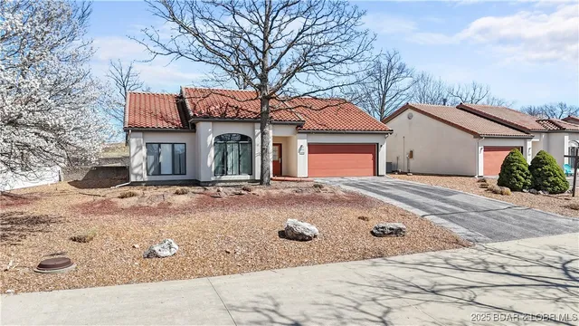 $315,000 | 590 Racquet Club Drive, Unit 406, Lake Ozark, MO 65049