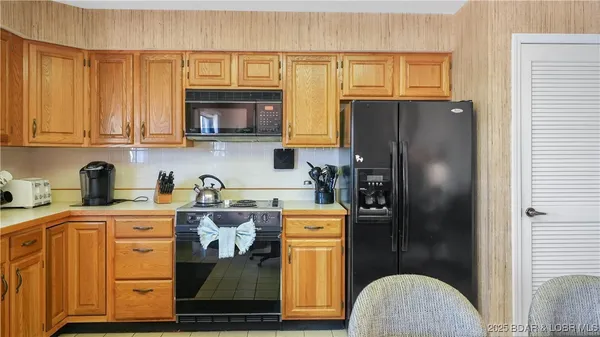 $315,000 | 590 Racquet Club Drive, Unit 406, Lake Ozark, MO 65049