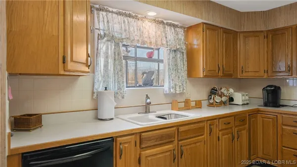 $315,000 | 590 Racquet Club Drive, Unit 406, Lake Ozark, MO 65049