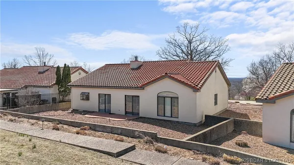 $315,000 | 590 Racquet Club Drive, Unit 406, Lake Ozark, MO 65049