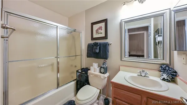 $315,000 | 590 Racquet Club Drive, Unit 406, Lake Ozark, MO 65049