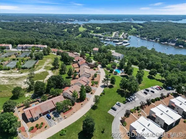 $315,000 | 590 Racquet Club Drive, Unit 406, Lake Ozark, MO 65049